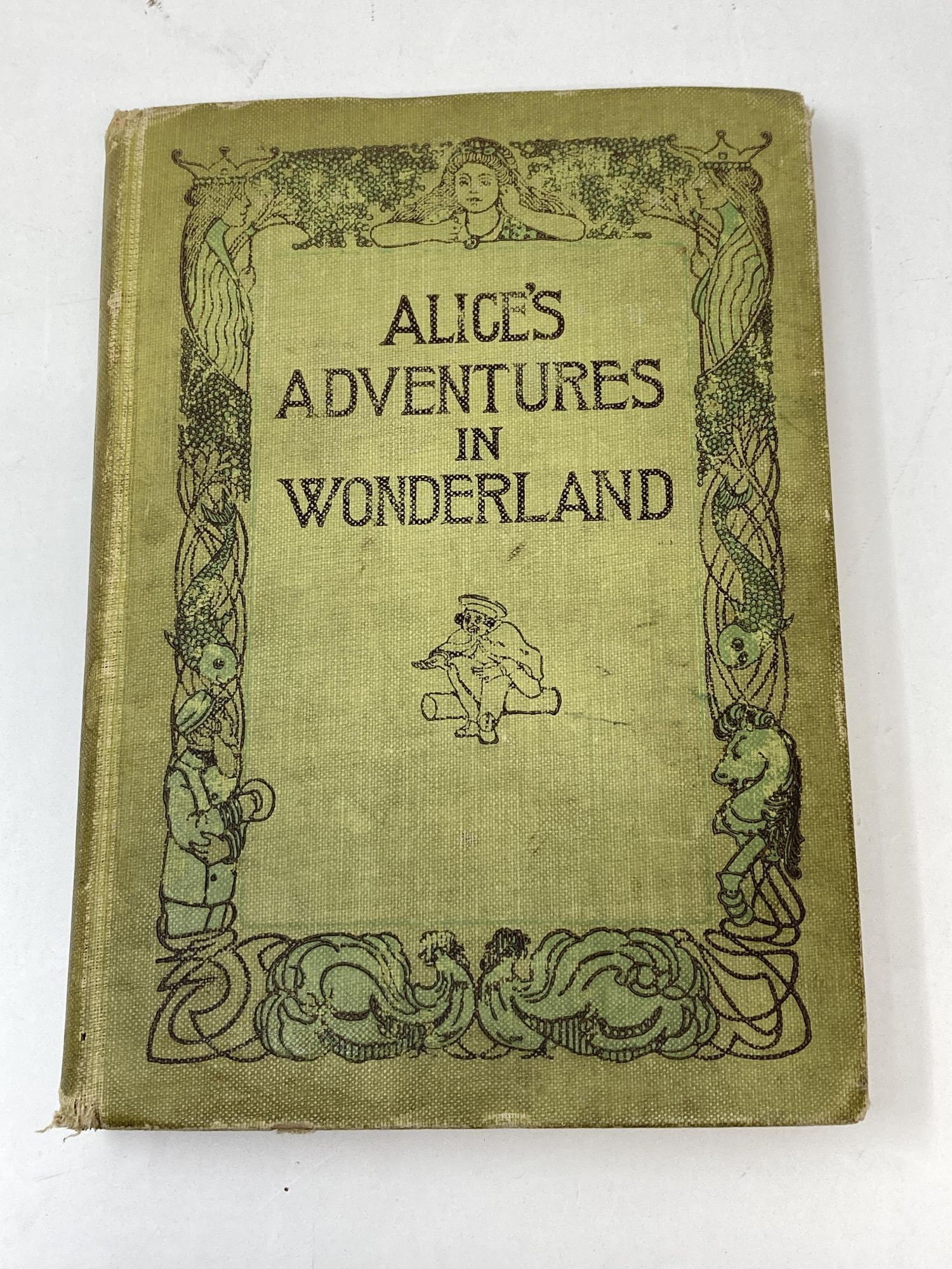 ALICE'S ADVENTURES IN WONDERLAND; (With an Introduction by E.S. Martin; Illustrated by Peter Newell)
