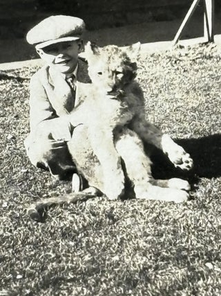A BOY AND HIS LION CUB – THREE PHOTOS OF ELBERT AND "SISSY" (A TWO-MONTH OLD LION CUB)